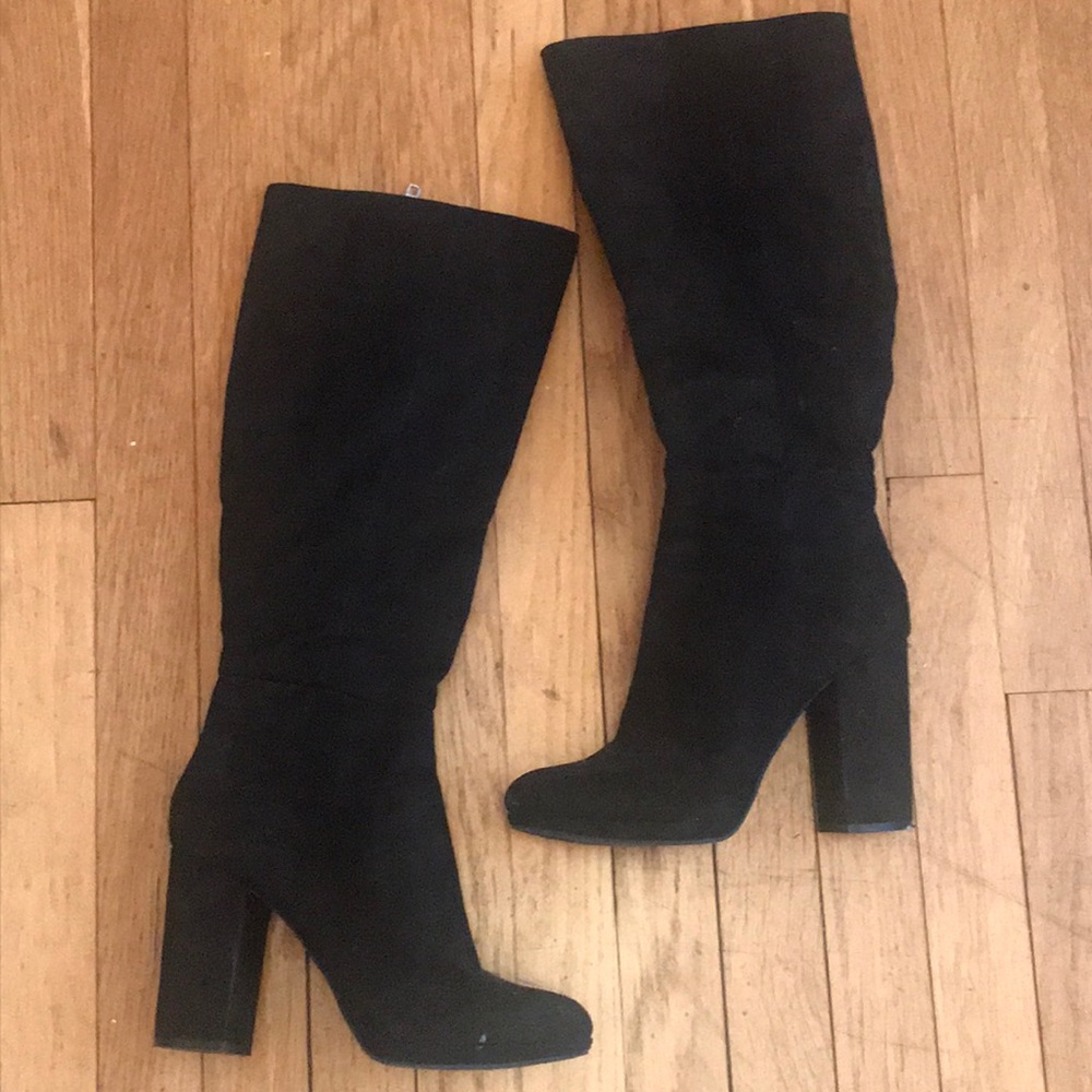 Tall black heeled boots